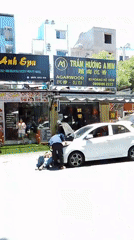 A busy Da Nang street corner, cafes to construction sites
