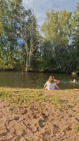 Afternoon swim at a shady riverbank in Innolovo