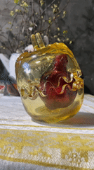 Glass apple with bottle removed from Moscow table