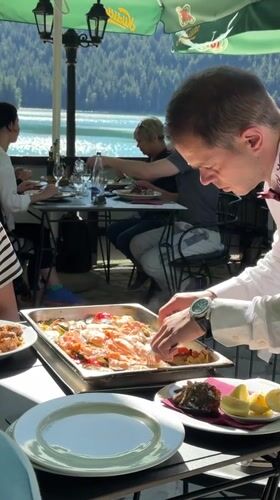 Lakeside restaurant service underway in Pitomine, Montenegro