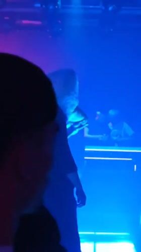 A Da Lat nightclub night: DJ booth, disco lights, and drinks