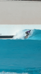 Surfer rides artificial waves at Tel Aviv wave pool facility