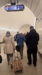Morning commuters navigate Saint Petersburg metro stations