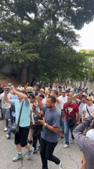Street procession draws diverse crowd in Caracas, Venezuela