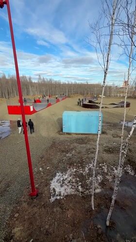 Spring flooding documented in Mirny, Russia with tree reflections