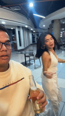 Man films selfie videos with dancing woman in Caracas venue