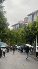Rainy day street scene observed in Chongqing High-tech Zone