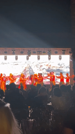 Outdoor stage show in Kemer, watched from a hookah table