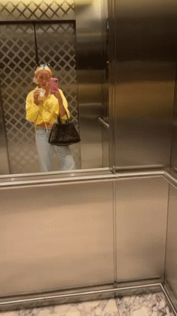 Woman Takes Selfies in Dubai Elevator and Parking Garage
