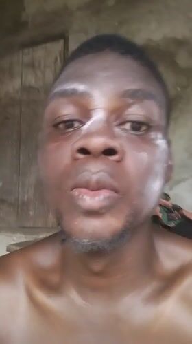 Man takes selfies with white face powder in Nigeria