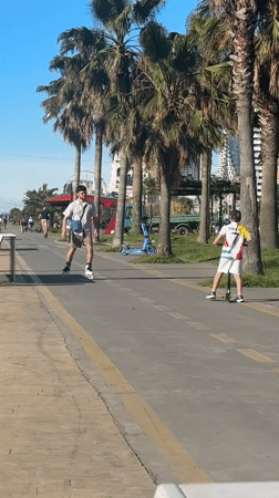 Sunny afternoon leisure activities captured on Batumi seaside promenade