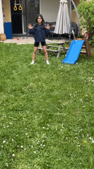 Girl with soccer ball photographed in German backyard