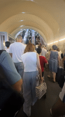 Yerevan transit station escalator scene with #YourRide branding