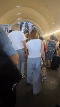 Yerevan transit station escalator scene with #YourRide branding