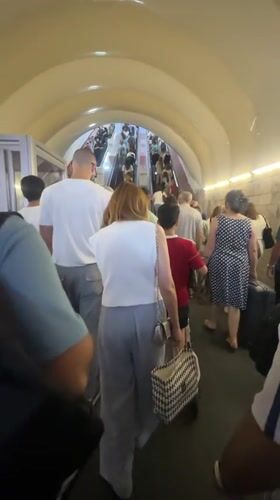Yerevan transit station escalator scene with #YourRide branding