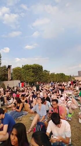 Outdoor concert on Champ de Mars, Eiffel Tower as backdrop