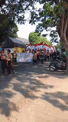 Scout parade and procession through Slawi streets