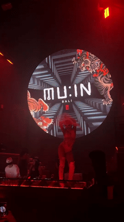 MU:IN Bali nightclub performance with dancers and tiger visuals