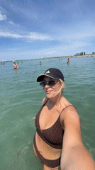 Selfie in the sea at a busy Anapa beach