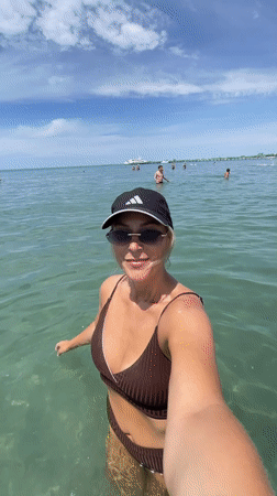 Selfie in the sea at a busy Anapa beach