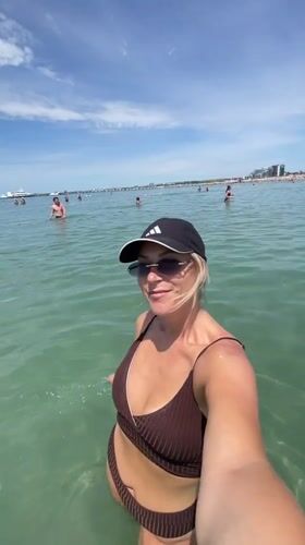 Selfie in the sea at a busy Anapa beach