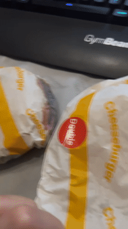 Double cheeseburger unwrapped in Burgas