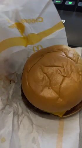 Double cheeseburger unwrapped in Burgas