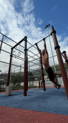 Man performs outdoor gymnastics at Montenegro fitness park