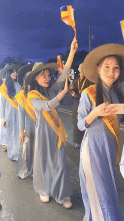 Buddhist procession with illuminated dragon floats parades through Da Lat