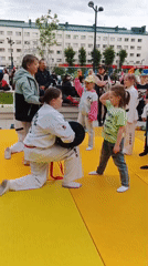 Girl practices karate and trampolines in rainy Syktyvkar