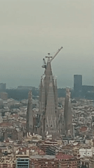 Sagrada Familia construction continues with crane visible from aerial view