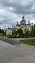 Morning documentation of Kozova church, silos, and railway infrastructure