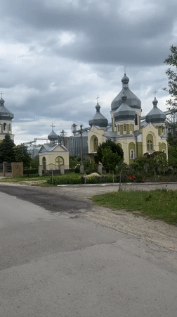Morning documentation of Kozova church, silos, and railway infrastructure