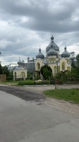 Morning documentation of Kozova church, silos, and railway infrastructure