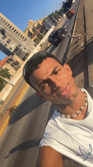 Young man films selfie video on Porlamar streets
