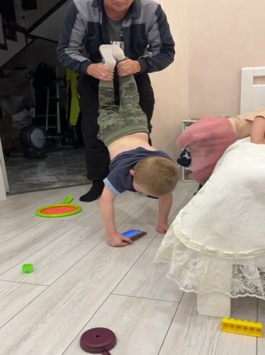 Family playtime documented in Rossiyskiy home