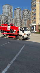 Tow truck transports fire truck through Yekaterinburg streets