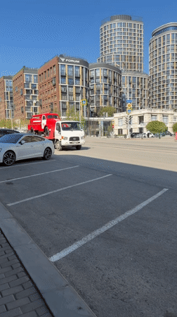 Tow truck transports fire truck through Yekaterinburg streets