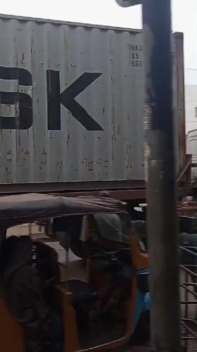 Street scenes with rickshaws, trucks documented in Nigerian towns