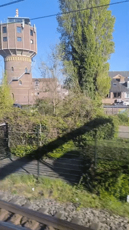 Train passenger films brick water tower in Alkmaar