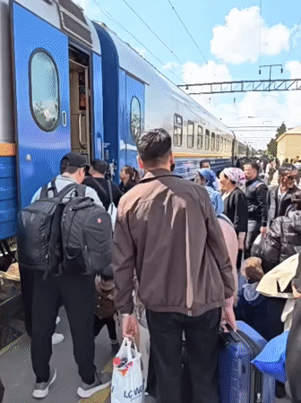 Morning train boarding and street scenes captured in Shymkent