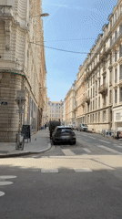 Street scenes captured in Lyon showing architecture, man on balcony