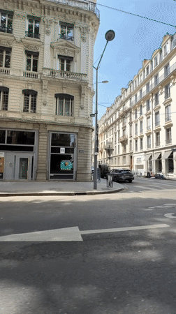 Street scenes captured in Lyon showing architecture, man on balcony