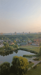 Golden hour drone tour of Brest's lakeside suburbs
