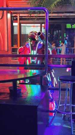 A night on Benidorm's strip: bars, neon, and costumes