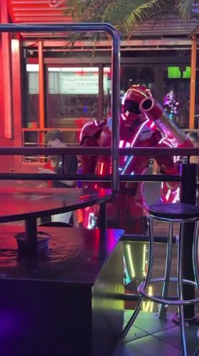 A night on Benidorm's strip: bars, neon, and costumes
