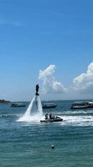 Flyboarding and beach activities captured in Bali resort areas