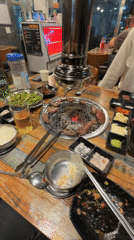 Korean BBQ lunch in Seoul, meat on the grill