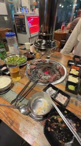 Korean BBQ lunch in Seoul, meat on the grill