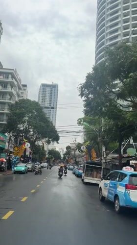 Overcast street scene captured in Nha Trang, Vietnam